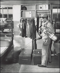 Indoor DDT spraying in the 1940s in a military facility in the Southeastern United States, shortly after this insecticide was introduced